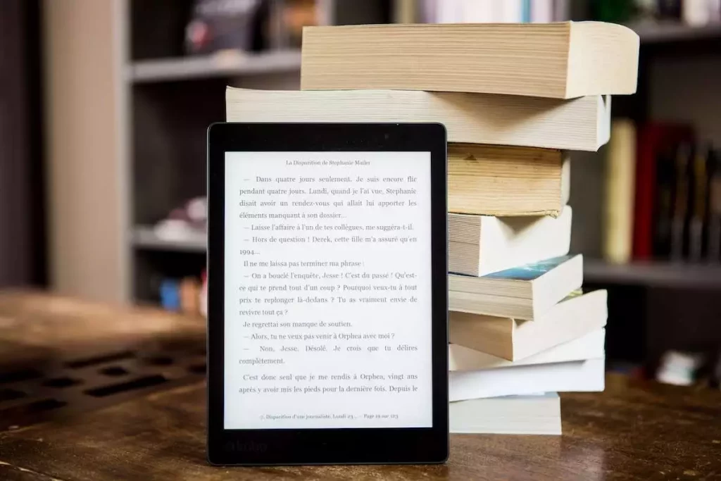 Kindle device kept next to books